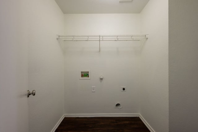 292 Dandelion Loop, Kyle, TX 78640 - washroom with electric dryer hookup, gas dryer hookup, washer hookup, dark wood-style floors, and baseboards