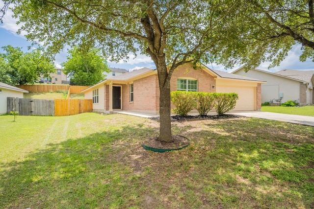292 Dandelion Loop, Kyle, TX 78640 - ranch-style home featuring driveway, a garage, and brick siding