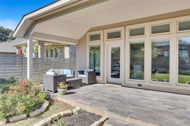 view of patio / terrace featuring fence and an outdoor living space