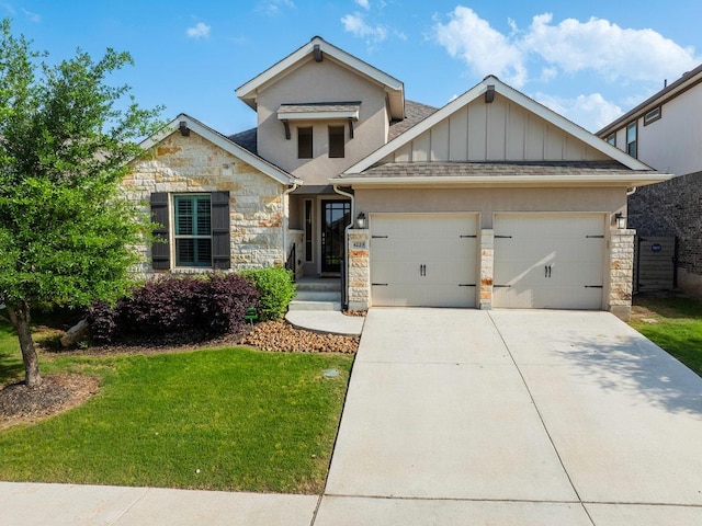 4229 Mercer Rd, Georgetown, TX 78628 - view of front facade with stone siding, board and batten siding, an attached garage, a front lawn, and concrete driveway
