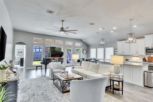 living area with visible vents, recessed lighting, light wood-style flooring, and ceiling fan