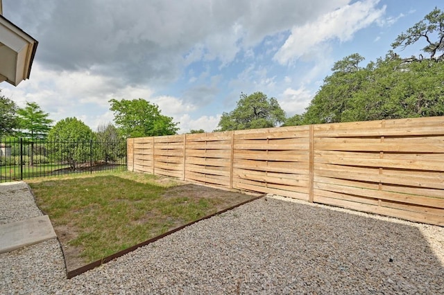 view of yard featuring a fenced backyard