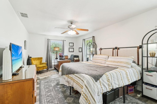 421 James St, Boerne, TX 78006 - bedroom featuring wood finished floors and a ceiling fan