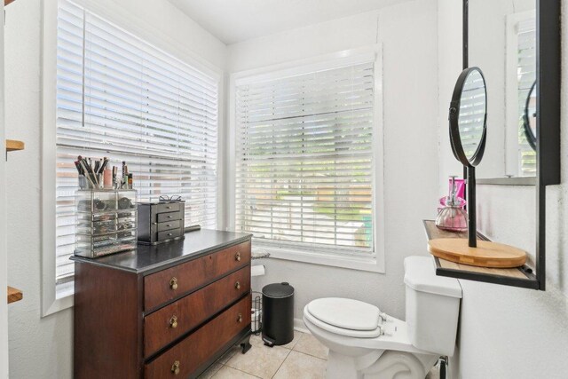 421 James St, Boerne, TX 78006 - half bathroom with toilet and tile patterned floors