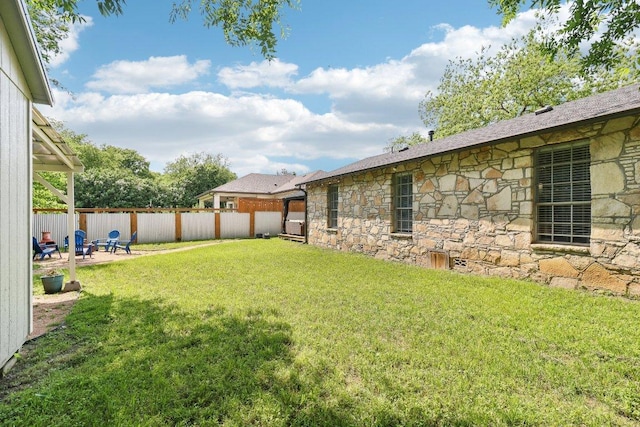 421 James St, Boerne, TX 78006 - view of yard featuring a patio area and an outdoor fire pit