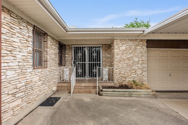 view of exterior entry featuring stone siding