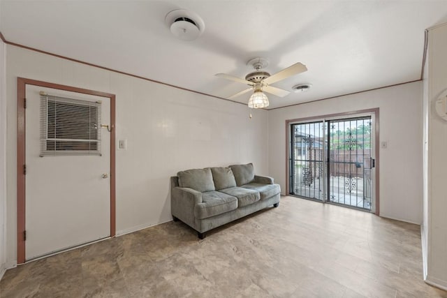 living area with ceiling fan and visible vents