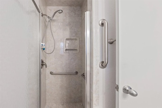 bathroom featuring a stall shower