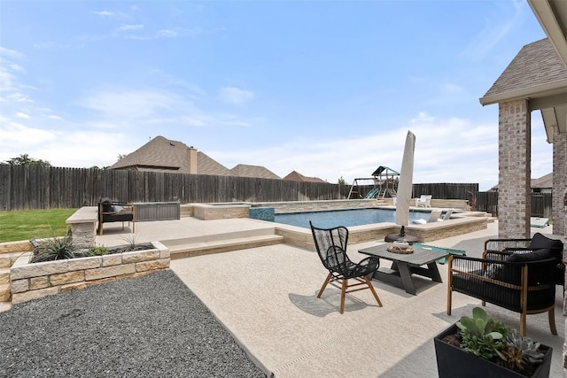 view of patio featuring a fenced in pool, a fenced backyard, a playground, and an outdoor hangout area