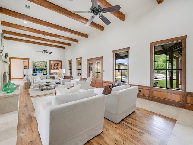 424 Hidden Creek Dr, Dripping Springs, TX 78620 - living area with a ceiling fan, beamed ceiling, wainscoting, recessed lighting, and french doors
