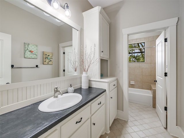424 Hidden Creek Dr, Dripping Springs, TX 78620 - bathroom featuring vanity, tile patterned flooring, and a bathtub