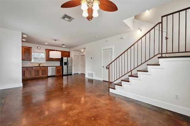 503 Allen St Unit 503A, Austin, TX 78702 - unfurnished living room featuring baseboards, a ceiling fan, concrete flooring, and visible vents