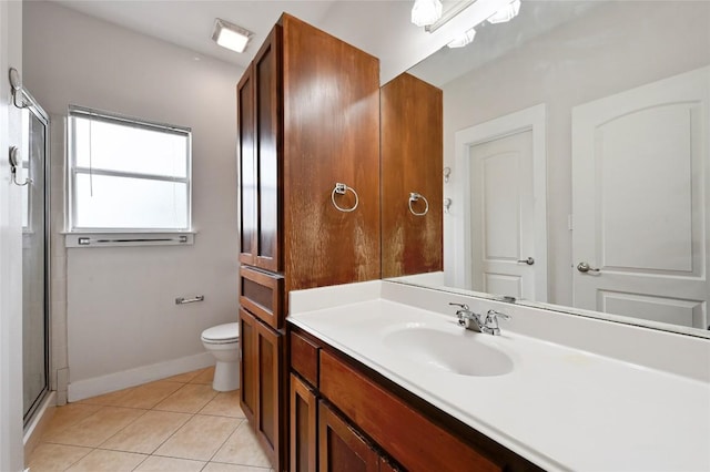 503 Allen St Unit 503A, Austin, TX 78702 - bathroom featuring tile patterned flooring, vanity, toilet, baseboards, and an enclosed shower