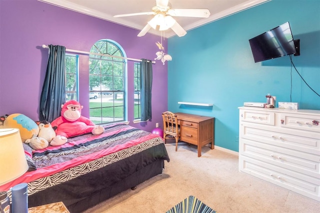 bedroom with crown molding, carpet flooring, and ceiling fan
