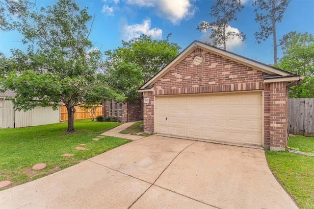view of front of house featuring fence, a front lawn, and brick siding