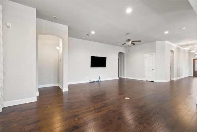 103 Lockhart Loop, Georgetown, TX 78628 - unfurnished living room featuring arched walkways, ceiling fan, recessed lighting, and hardwood / wood-style floors