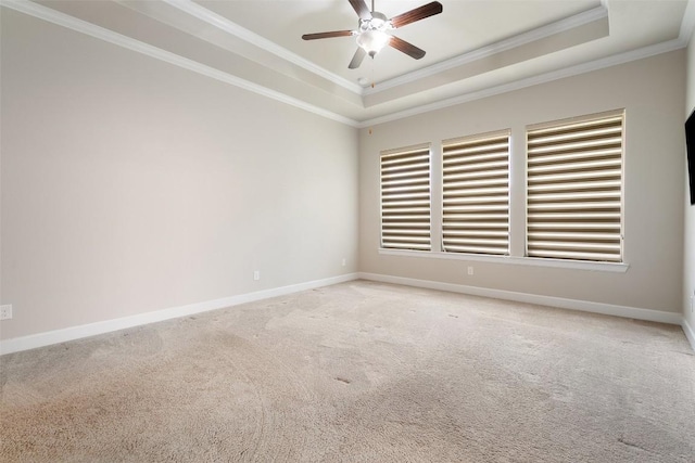 103 Lockhart Loop, Georgetown, TX 78628 - empty room with a tray ceiling, a ceiling fan, crown molding, and carpet
