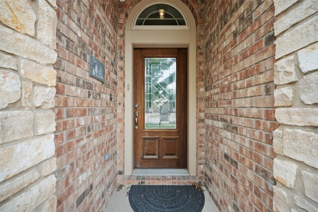 103 Lockhart Loop, Georgetown, TX 78628 - entrance to property featuring brick siding