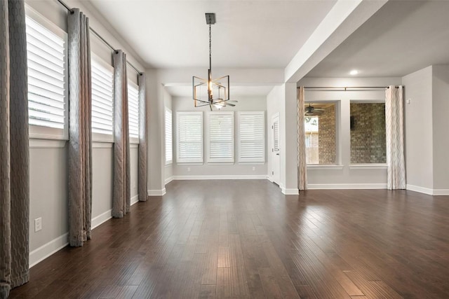 103 Lockhart Loop, Georgetown, TX 78628 - unfurnished dining area with a chandelier, dark wood-style flooring, recessed lighting, and ceiling fan