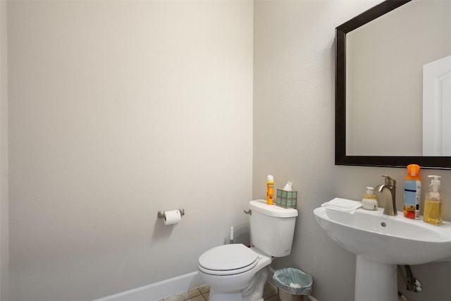103 Lockhart Loop, Georgetown, TX 78628 - half bathroom featuring baseboards and tile patterned floors