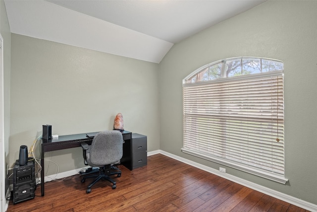 office with baseboards, vaulted ceiling, and hardwood / wood-style flooring