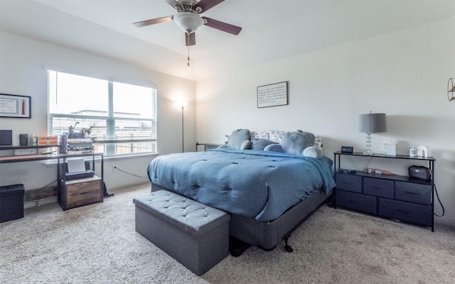 carpeted bedroom with a ceiling fan