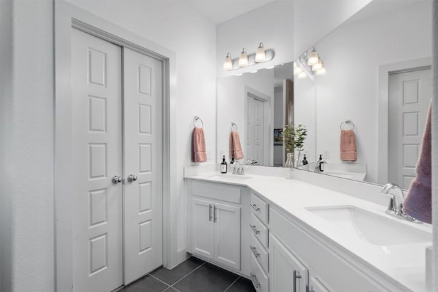 907 Totis Rd, Austin, TX 78748 - full bath featuring tile patterned floors and double vanity