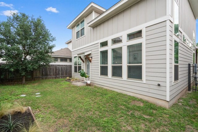 907 Totis Rd, Austin, TX 78748 - back of house with board and batten siding