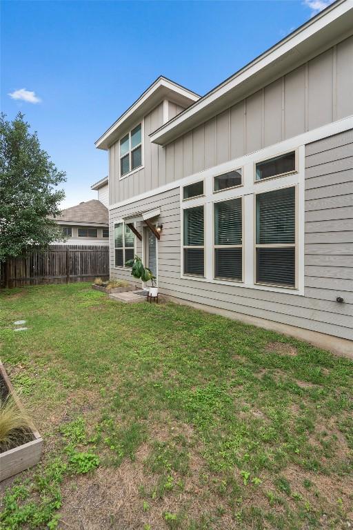 907 Totis Rd, Austin, TX 78748 - rear view of house featuring board and batten siding