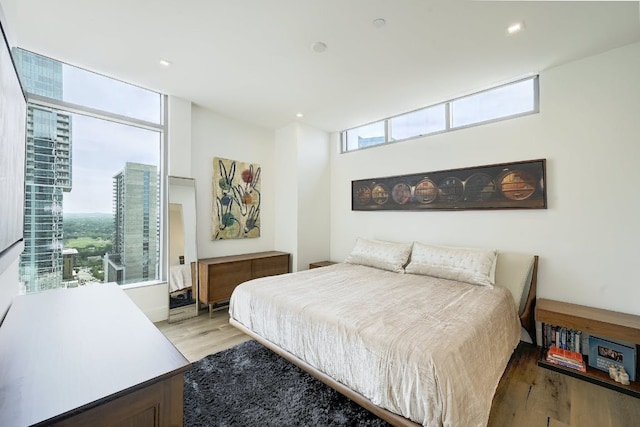 bedroom with light wood-type flooring