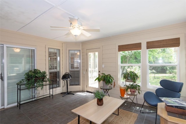 sunroom featuring tile patterned flooring