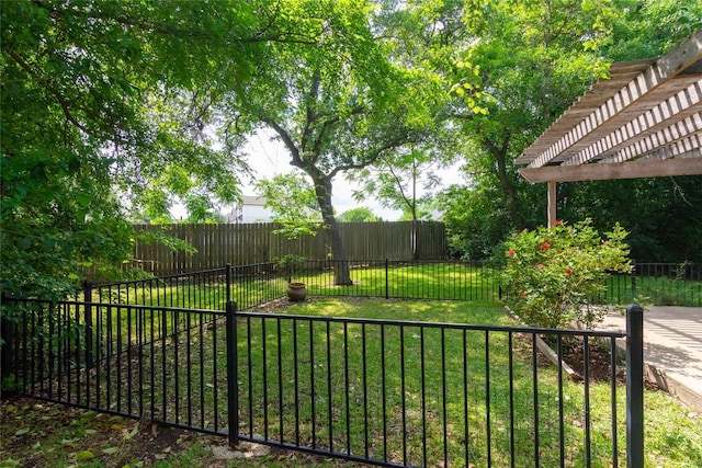 view of yard with a pergola and a fenced backyard