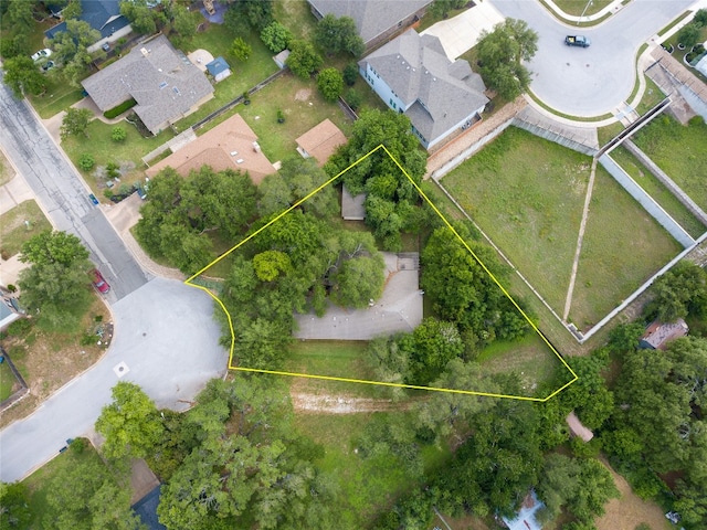 birds eye view of property with a residential view