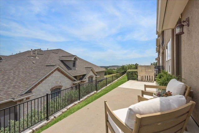 view of patio with a balcony