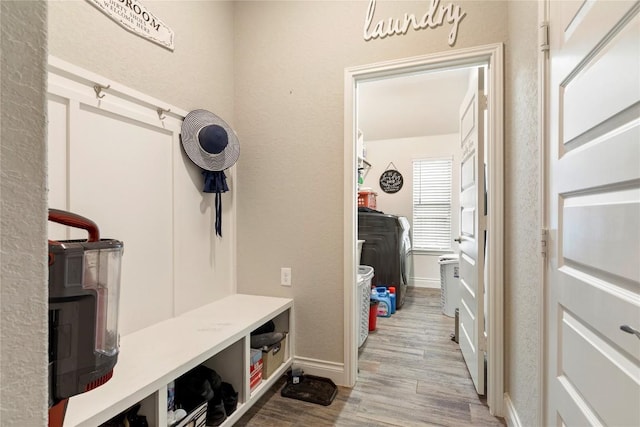 3105 High Meadow St, Seguin, TX 78155 - mudroom featuring wood finished floors, baseboards, and washer / clothes dryer