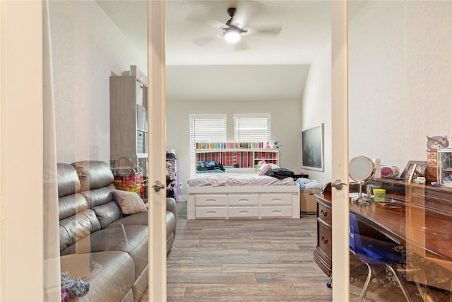 3105 High Meadow St, Seguin, TX 78155 - bedroom featuring light wood-style floors, french doors, and a ceiling fan