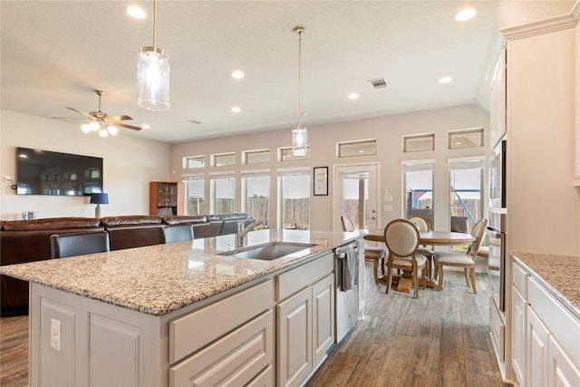 3105 High Meadow St, Seguin, TX 78155 - kitchen with a sink, dark wood-type flooring, plenty of natural light, stainless steel appliances, and recessed lighting