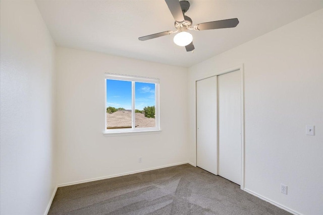 3006 Tyler Ln, Taylor, TX 76574 - unfurnished bedroom with carpet flooring, a closet, a ceiling fan, and baseboards
