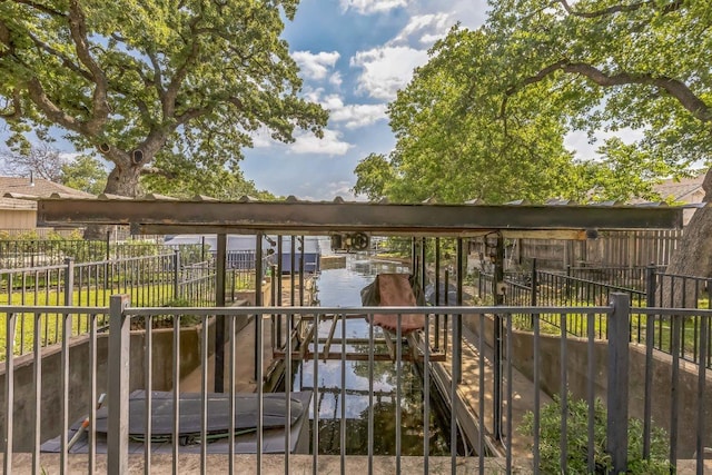 exterior space with a water view
