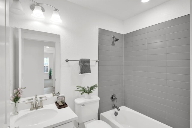 full bathroom with toilet, shower / washtub combination, and vanity
