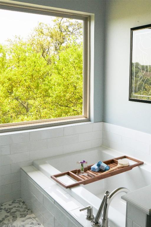5705 Puccoon Cv, Austin, TX 78759 - bathroom featuring tiled bath