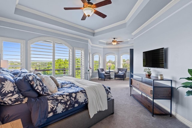 5705 Puccoon Cv, Austin, TX 78759 - carpeted bedroom with multiple windows, a tray ceiling, crown molding, baseboards, and a ceiling fan