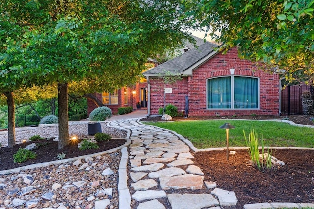 5705 Puccoon Cv, Austin, TX 78759 - view of front of home with brick siding and a shingled roof