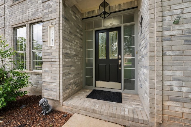 2045 Saint Andrews Dr, Round Rock, TX 78664 - view of exterior entry with brick siding and french doors