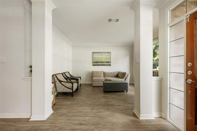 2045 Saint Andrews Dr, Round Rock, TX 78664 - sitting room featuring crown molding and wood finished floors