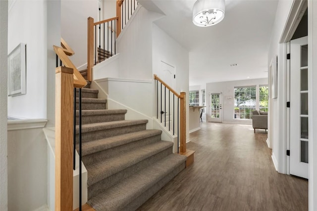 2045 Saint Andrews Dr, Round Rock, TX 78664 - entryway with stairs, wood finished floors, and a chandelier