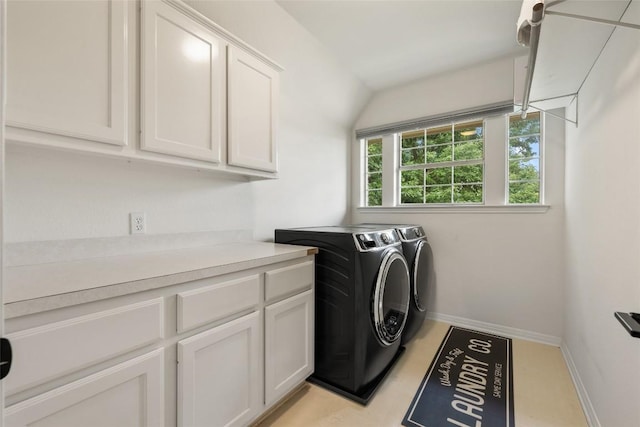 2045 Saint Andrews Dr, Round Rock, TX 78664 - laundry room with cabinet space and washer and dryer
