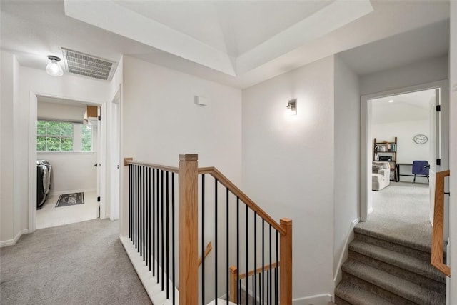 2045 Saint Andrews Dr, Round Rock, TX 78664 - hall featuring carpet flooring, separate washer and dryer, and an upstairs landing