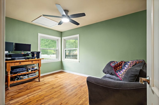 1516 Madison Ave, Austin, TX 78757 - office space featuring wood finished floors, ceiling fan, and baseboards