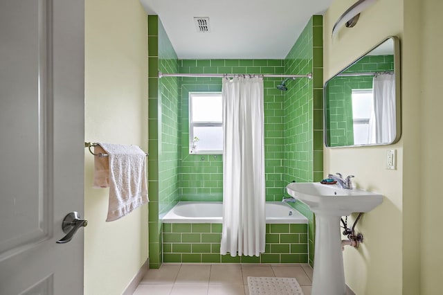 1516 Madison Ave, Austin, TX 78757 - full bathroom featuring tiled shower / bath, tile patterned flooring, and a sink